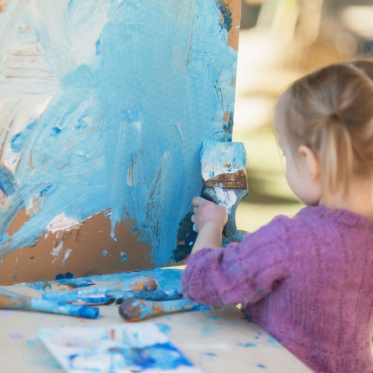 Messy painting play at Brooklyn Busy Bees