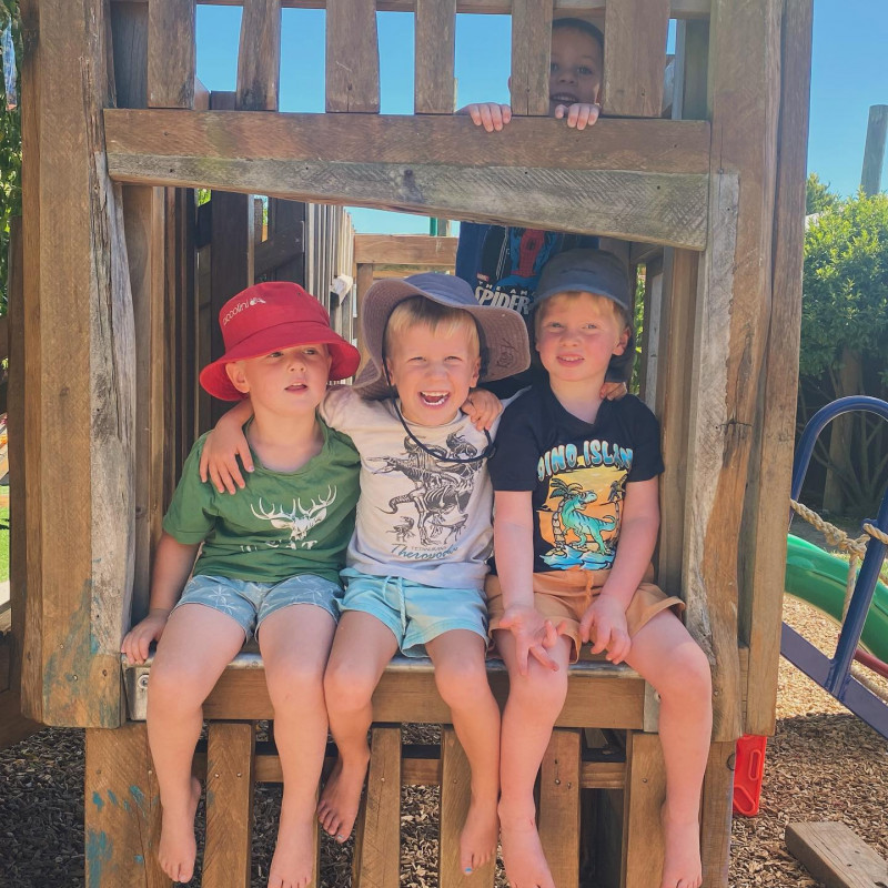 Boys enjoying the fort on a sunny day at Busy Bees Hastings