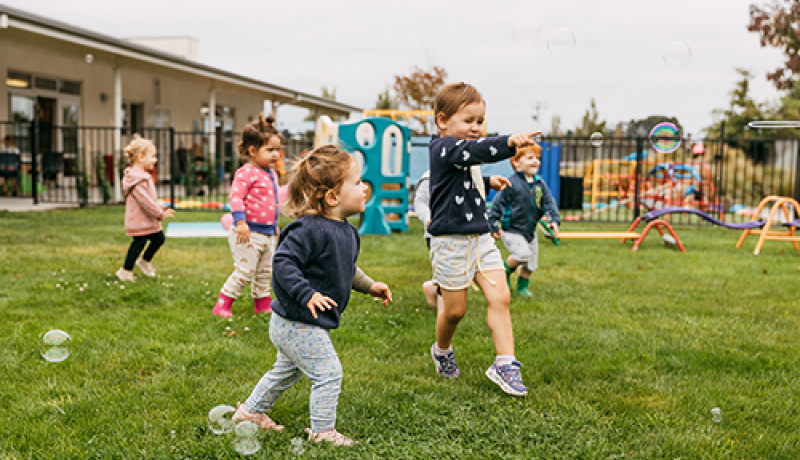 Children playing outdoors at Busy Bees Judsons Road