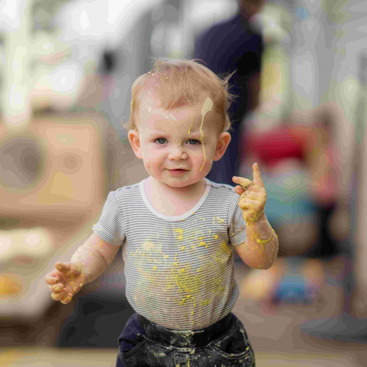 Messy play with paint at Busy Bees Mangakakaki