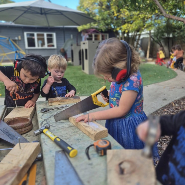 Busy Bees Motueka Building using tools
