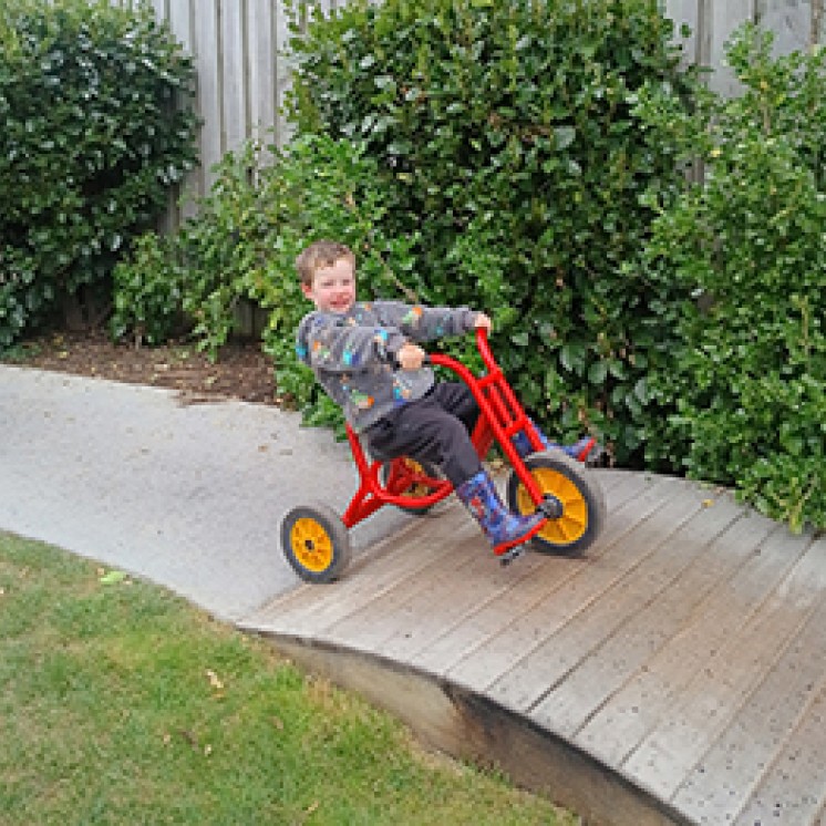 Happy child outdoor challenge bike fun