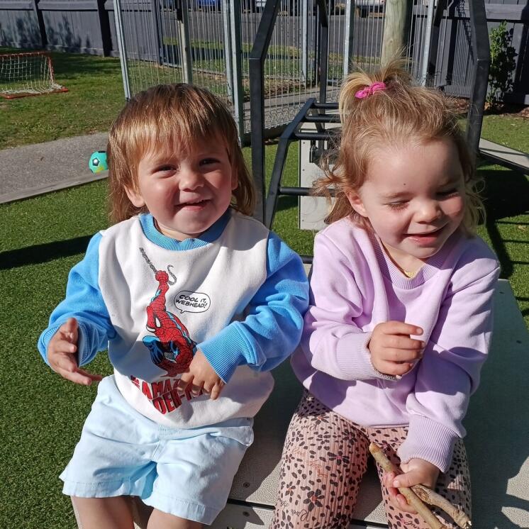 Busy Bees Putaruru childcare centre toddlers outside at outdoor payground