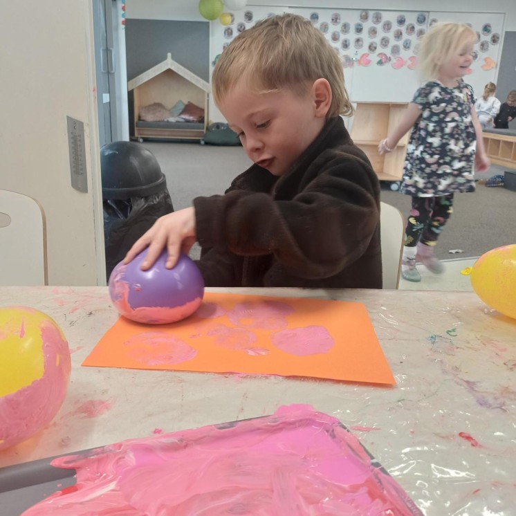 Painting and craft learning at Busy Bees Stoke Preschool