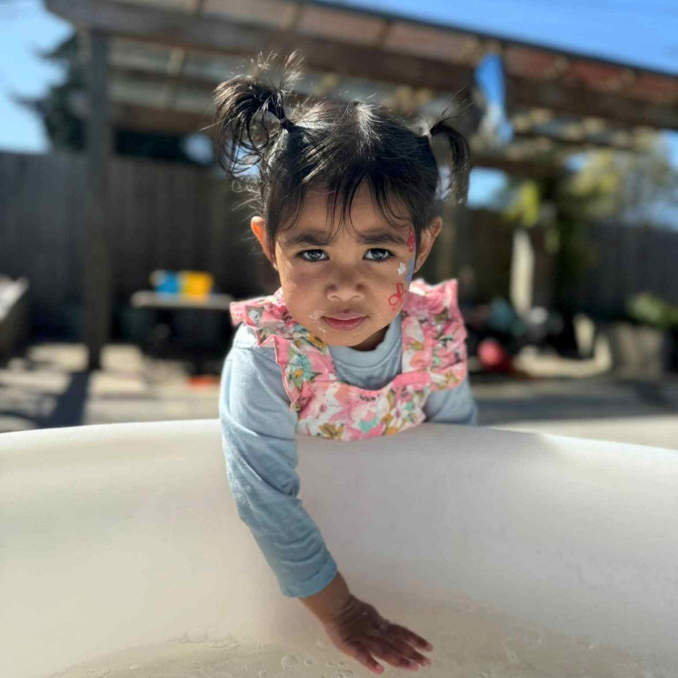 Waterplay with toddler at Busy Bees Taupo