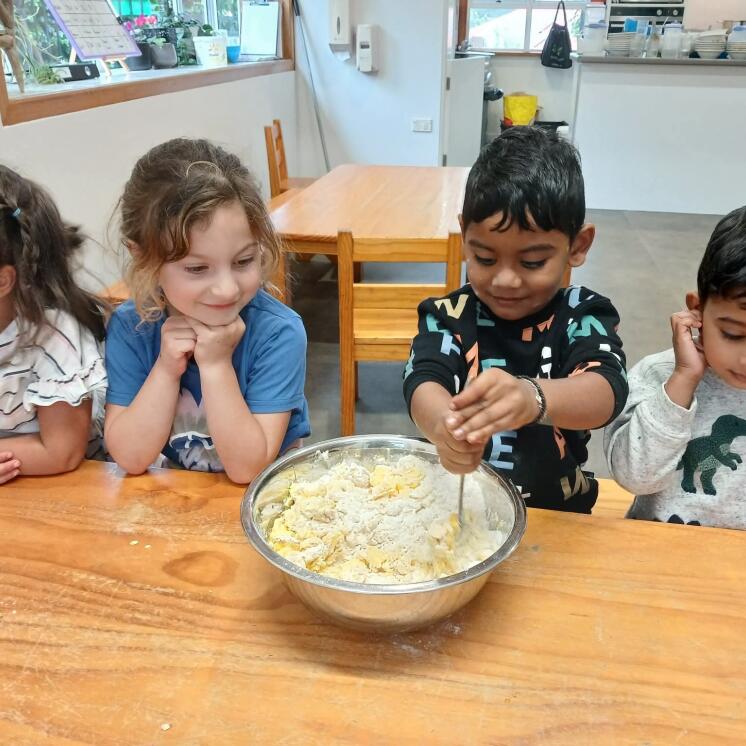 Baking in preschool at Busy Bees Whau Valley 